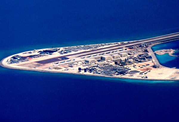 Defense chief on Philippine-occupied island in disputed seas Defense chief on Philippine-occupied island in disputed seas