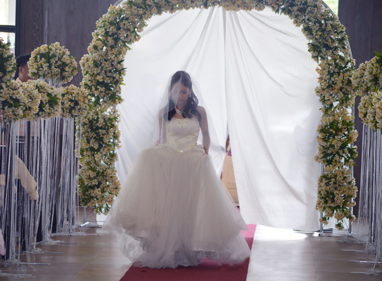 Walking down the aisle at Kasalang Bayan at Lancaster New City