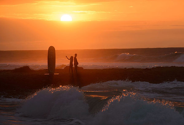 Spectators and surfers flock to the coast as mega swell continues through  Friday – Orange County Register