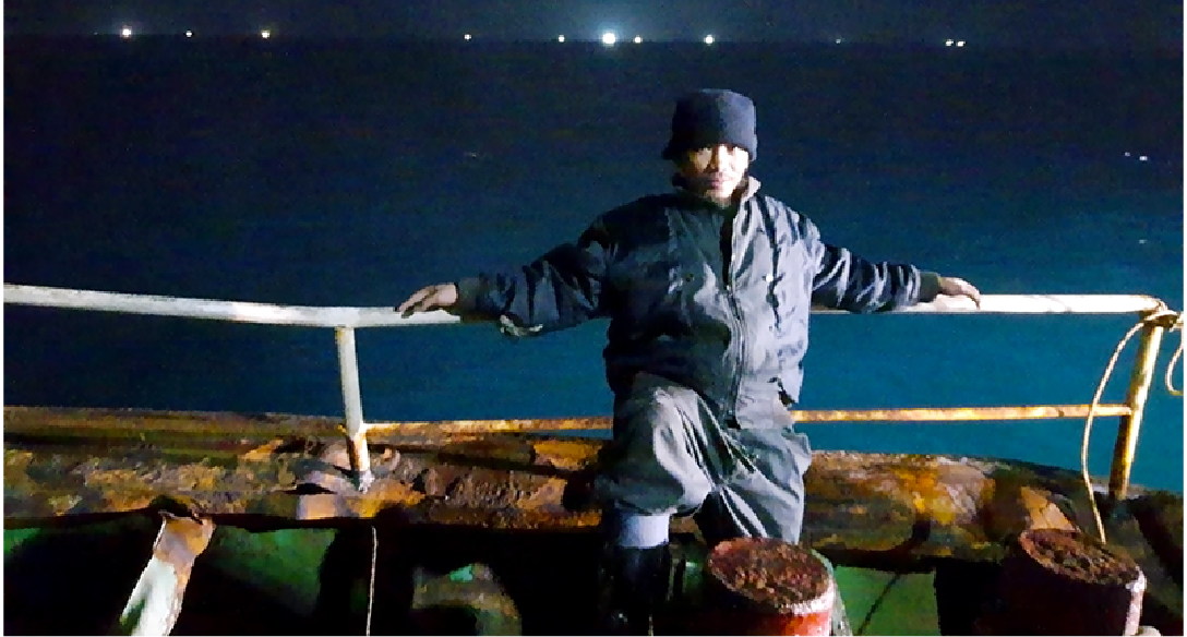 Nante Maglangit poses on board a Chinese fishing vessel in this undated photo. (Nante Maglangit)