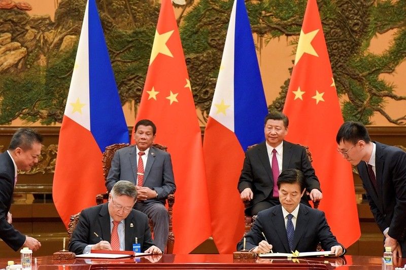 Philippines, China commit to South China Sea freedom of navigation