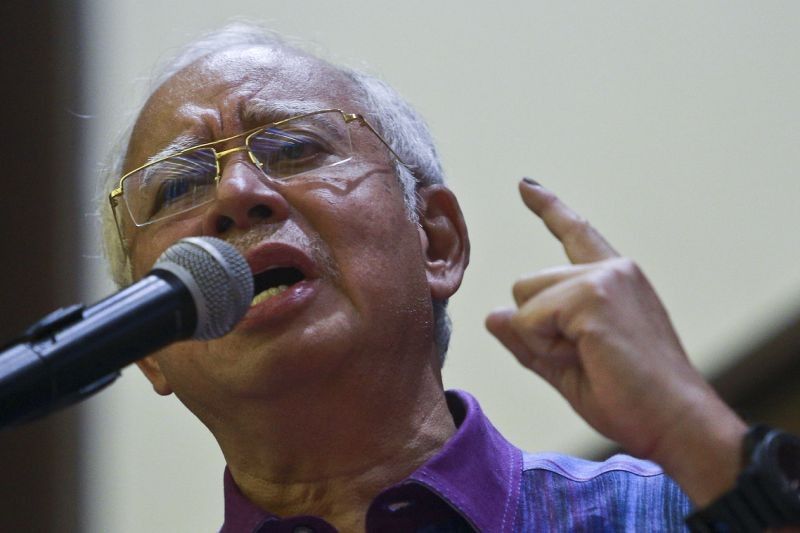 Malaysia ex-leader seeks police protection amid graft probe