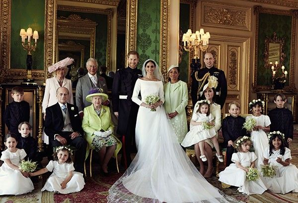 Palace shares family portrait, Prince Harry and Meghan's royal wedding photos
