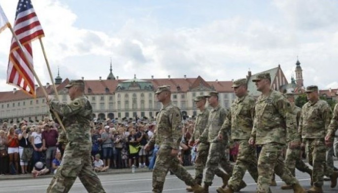 Poland marks Army Day with parade, call for US military base