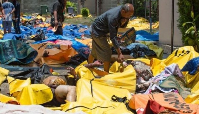 Distraught Indonesians in grim search for family members