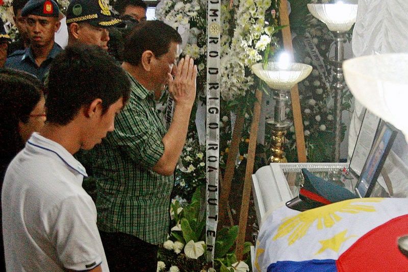 Duterte skips slain farmersâ��  wake due to bad weather