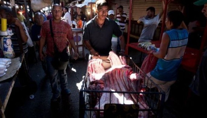 Venezuela nervously await dramatic economic reforms