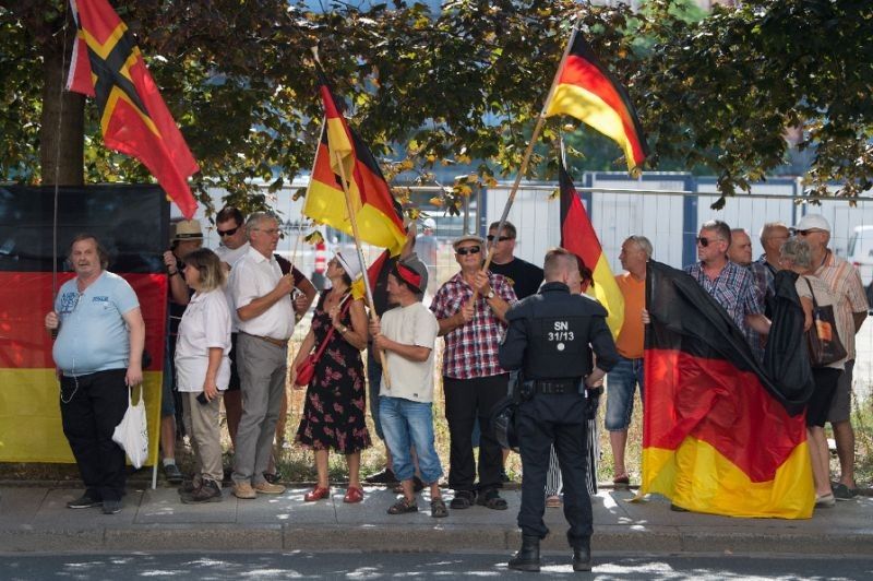 Merkel stresses media freedom after police blocked TV crew at far-right rally