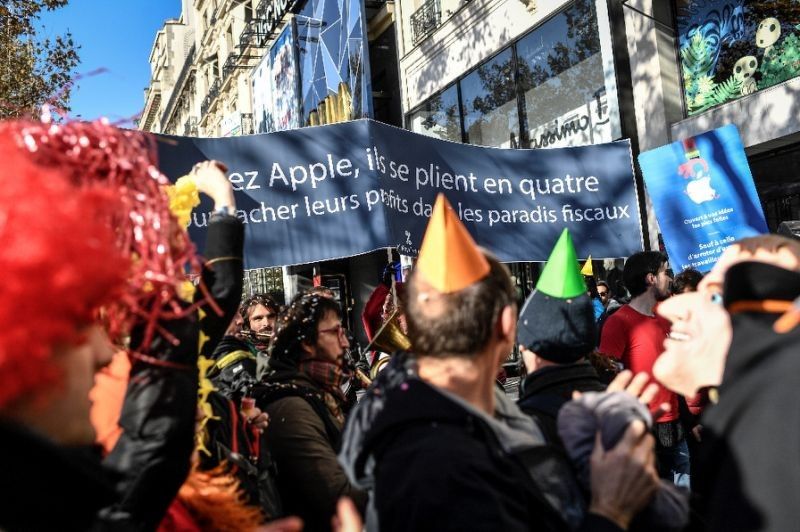 Protest greets Apple's Champs Elysees launch