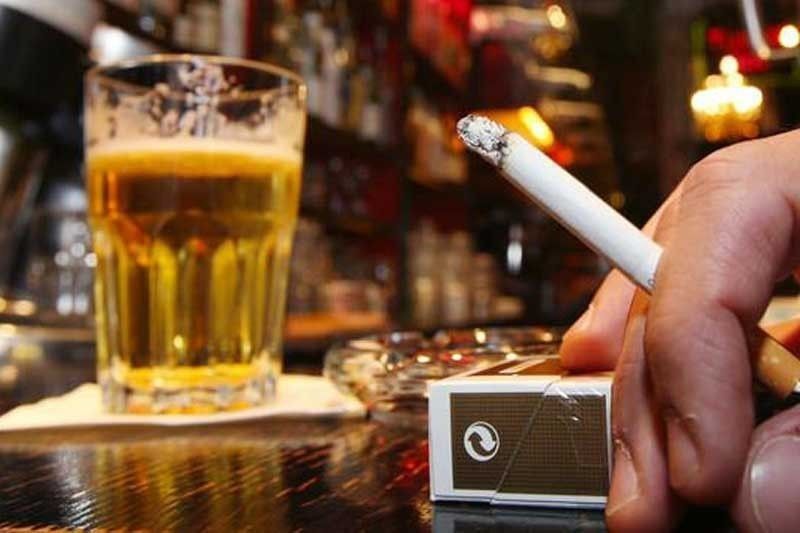 House OKs  higher tax  on liquor,  cigarettes