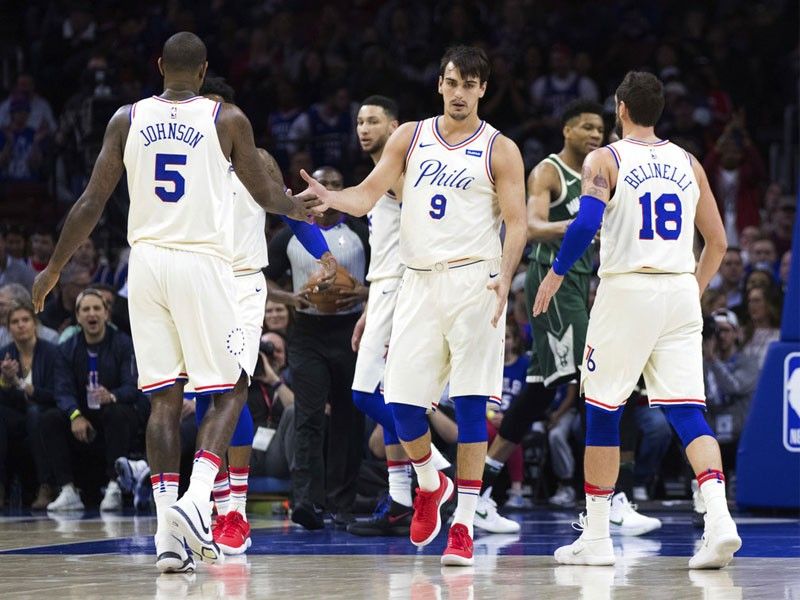 76ers win 16th straight, earn No. 3 seed with rout of Bucks