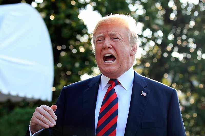 Trump says 'let Russia back in' as he heads for G-7 summit