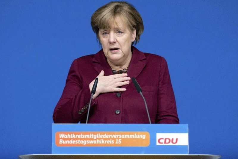EU impasse on sharing burden of migrants weighs on Merkel