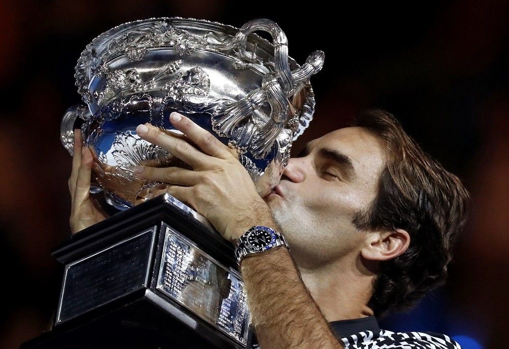 Federer savors unexpected title over long-time rival Nadal