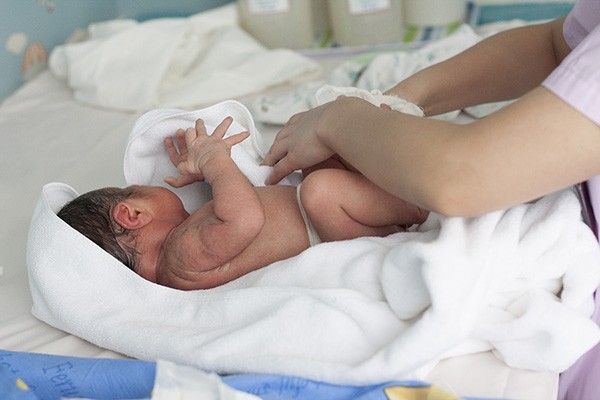 Japan mother held for dumping newborn baby's body in locker