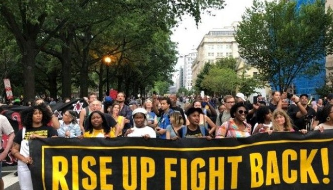 Counter-protest drowns out small Washington neo-Nazi rally