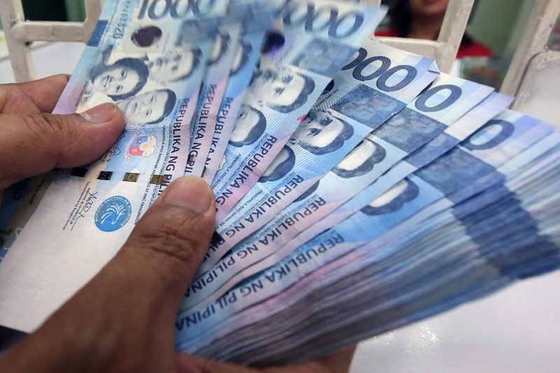 Peso recovers, stays within 54:$1