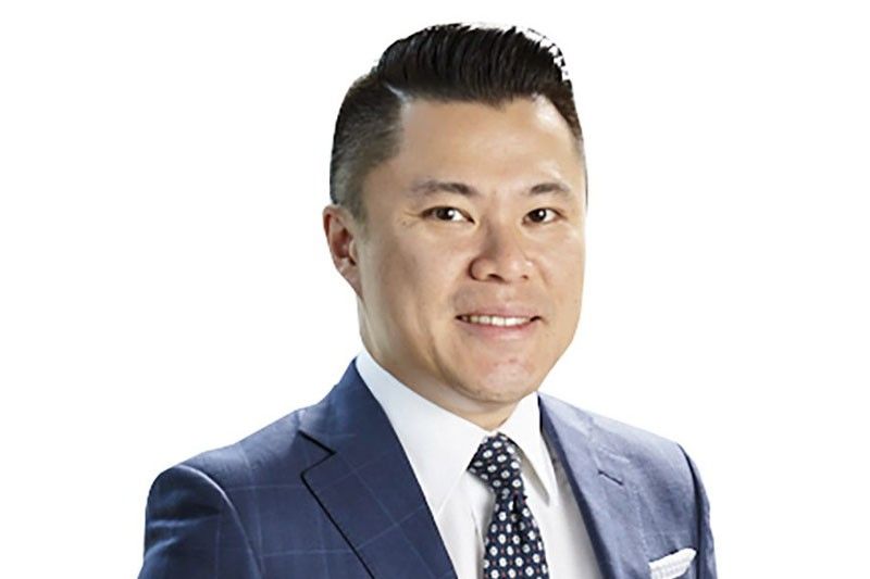 Alliance Global names Kevin Tan as next CEO
