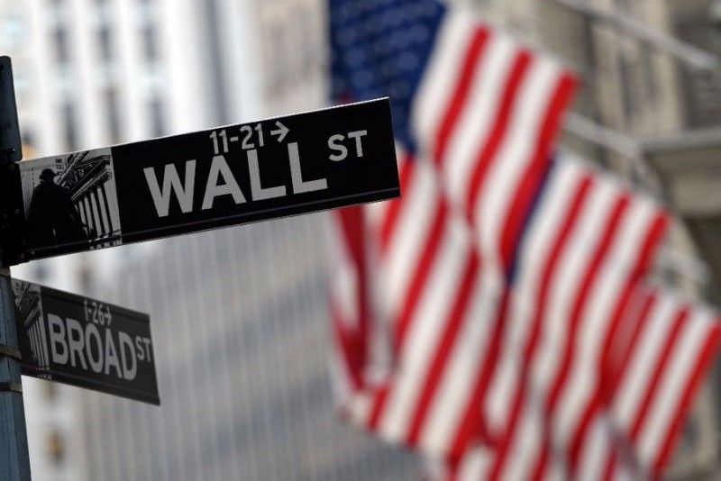 Wall Street woes drag local stocks down