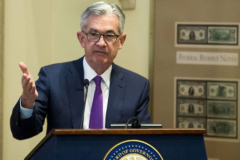 Fed officials cautious on pace of future rate hikes