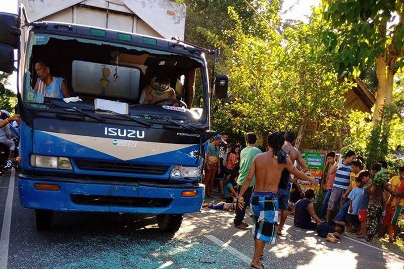 Collision kills 4, injures 11