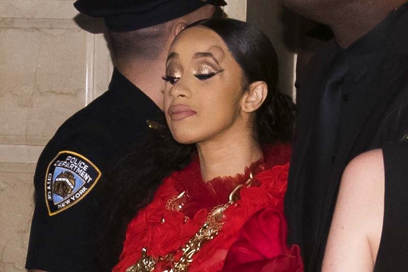 Cardi B escorted out of fashion party after lunging at Minaj