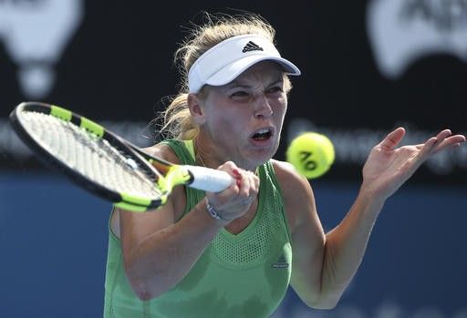 Former No. 1 Wozniacki beats Olympic champion Puig in Sydney