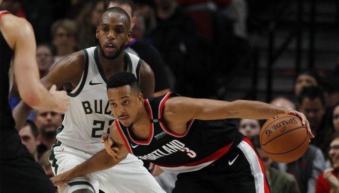 McCollum drops 40 points as Trail Blazers subdue Bucks