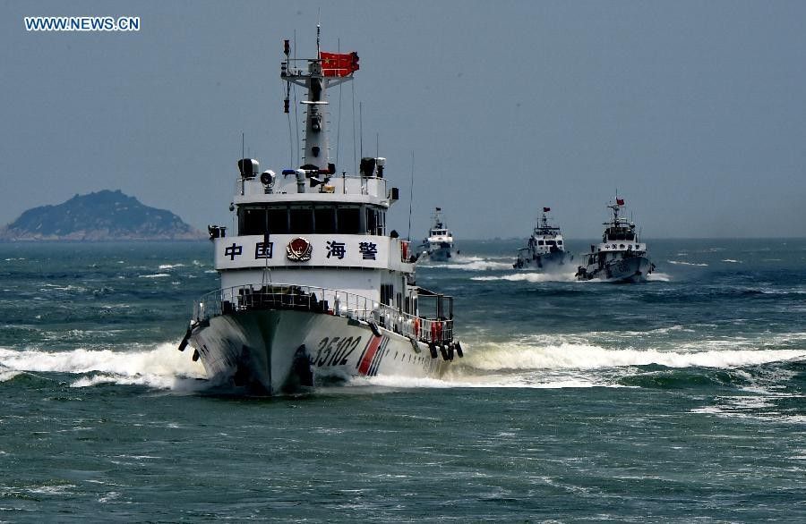 China places coast guard under military command