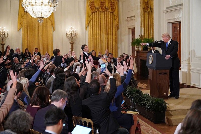 CNN sues over barring of reporter, White House vows vigorous defense