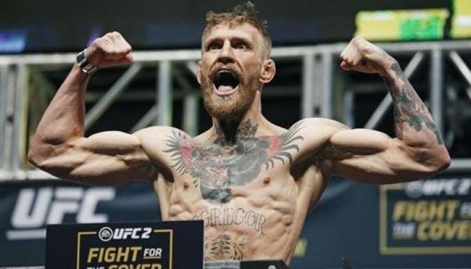 UFC star McGregor surrenders to New York police over bus attack