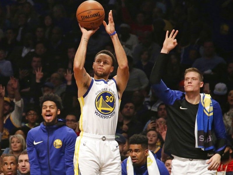 Curry sets another record for 3s as Warriors hold off Nets