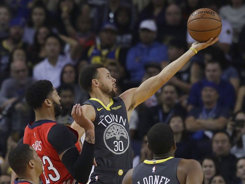 Curry's big night carries Warriors to sixth straight win