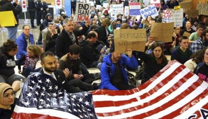 European leaders oppose Trump travel ban, far right applauds