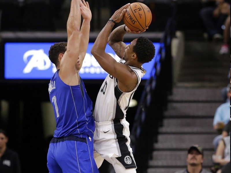 DeRozan outduels Doncic as Spurs outlast Mavs in OT