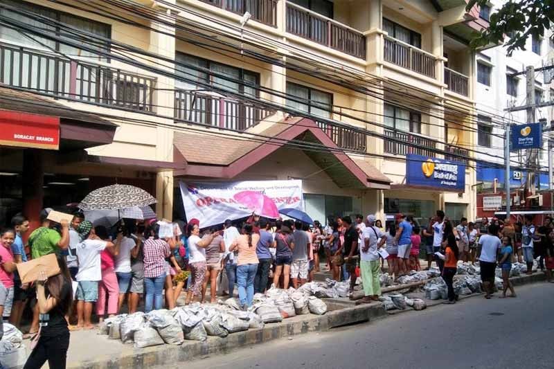 Displaced workers seek transportation aid as Boracay begins closure