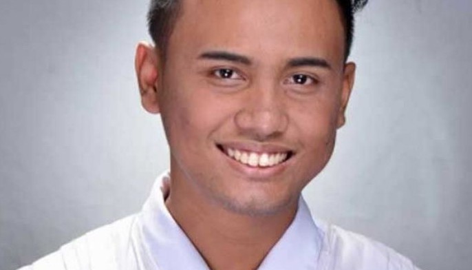 Janitress&rsquo; son graduates valedictorian