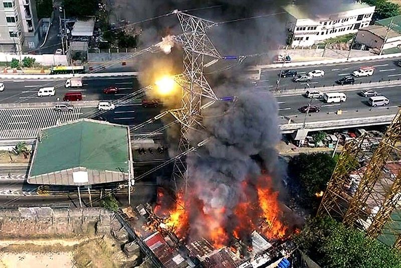 Fire topples transmission tower at SLEX in Alabang