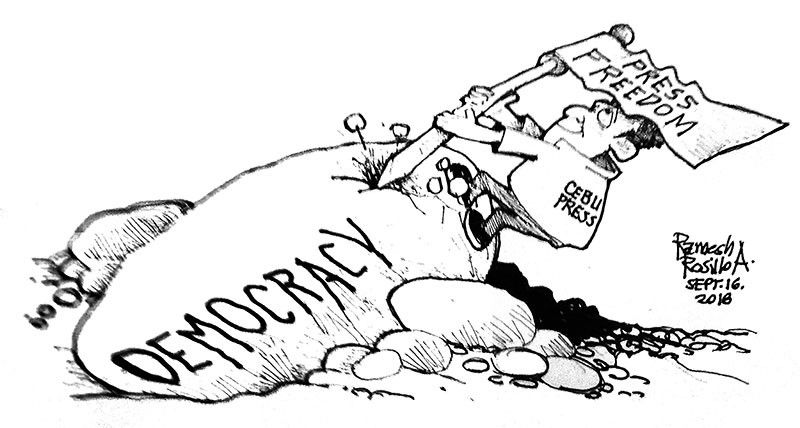 EDITORIAL - Champions of press freedom