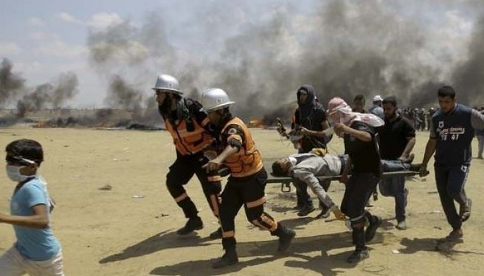 Palestinians bury dead after bloodiest Gaza day since 2014