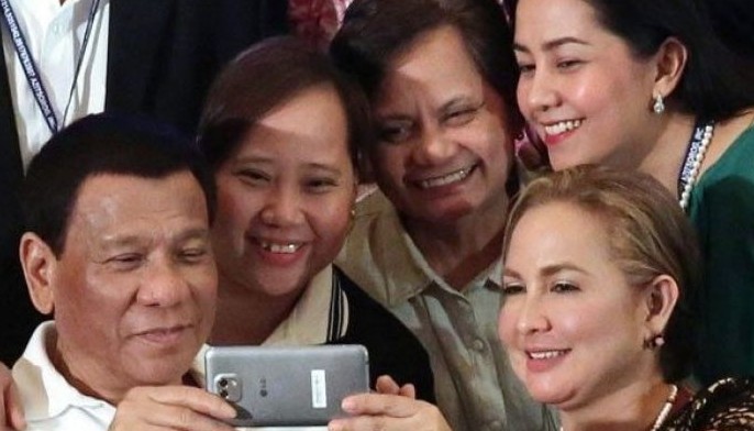 Duterte doesn&rsquo;t mind being spat on by beautiful women