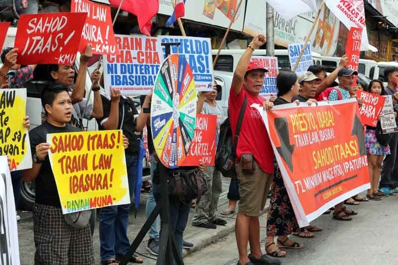 Leftist lawmakers back TRAIN suspension | Philstar.com