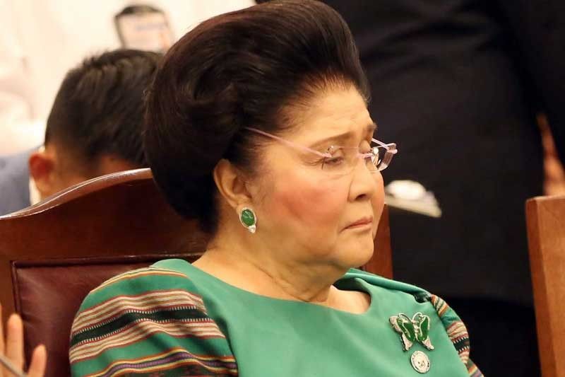 SC affirms Imelda acquittal in dollar salting cases