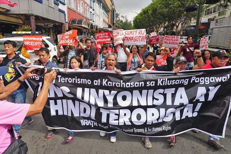 Duterte urged to prosecute suspects behind Sagay massacre