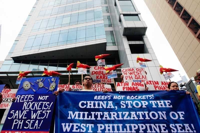Palace dares critics of Duterte's South China Sea policy to file a court case