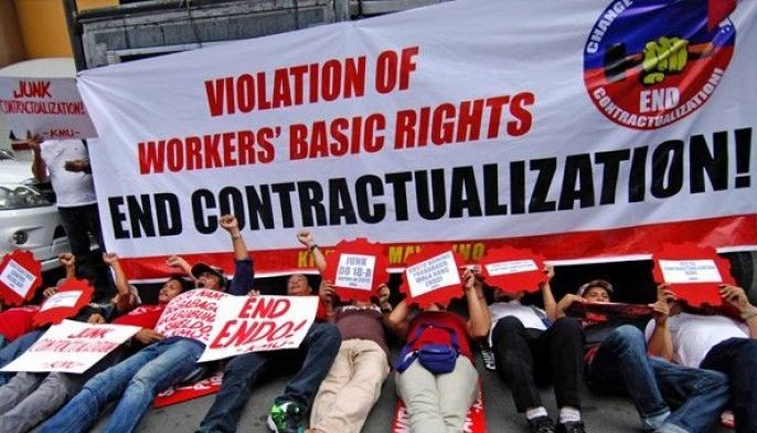 Labor groups await signing of executive order on job contracting