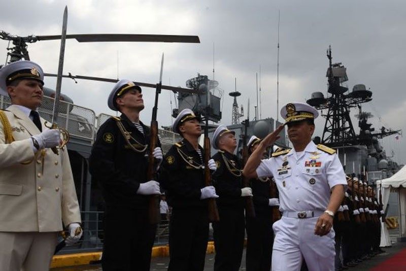 Russian forces too much for Filipinosâ�¦ in tug-of-war