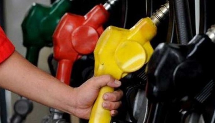 Oil firms roll back prices