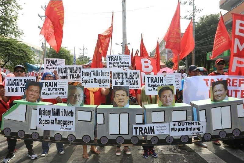 â��Duterte, Cabinet to gain P8,500 a month from TRAIN lawâ��