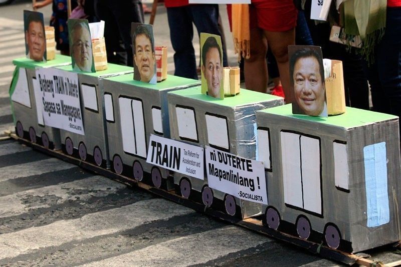 Bayan urges Congress to stop TRAIN law implementation